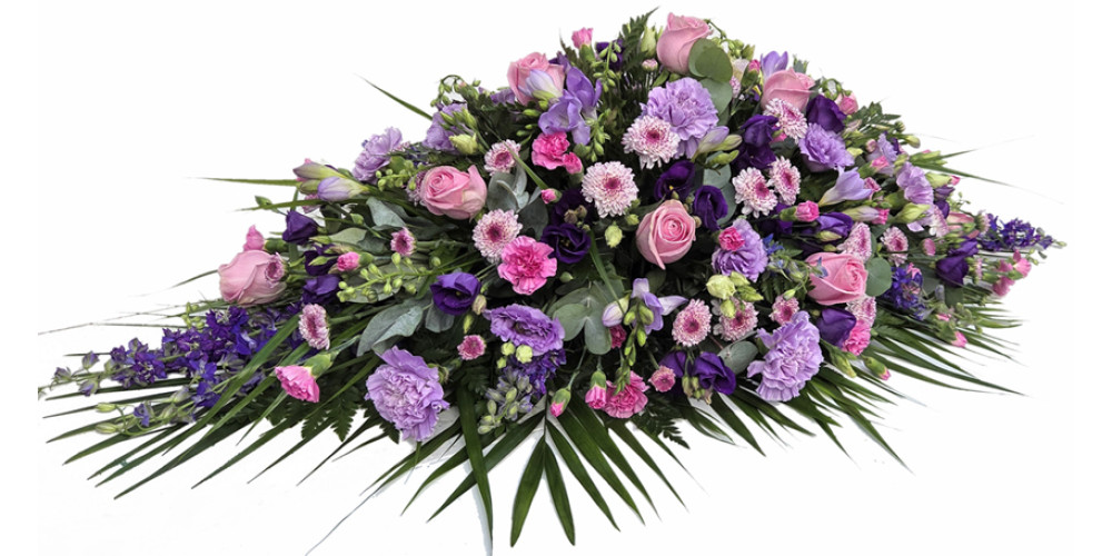 Lilac, Pink and Purple casket spray funeral flowers