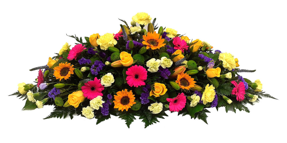 Vibrant Sunshine casket spray 